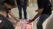 Polisi Bongkar Produksi Uang Palsu Rp 100 Ribu di Kamar Hotel Bogor