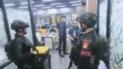 Brimob Turun Tangan Bongkar Judi Online Jaringan Internasional di Hayam Wuruk