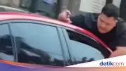 Viral Pria Nemplok di Mobil Diduga Masalah Keluarga, Polisi Siap Mediasi