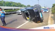 Gagal Nyalip, Jeep Listrik Hantam Pembatas Jalan lalu Terguling di Tol Soetta