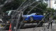 BMW Misterius Tanpa Plat Parkir di JLNT Antasari, Polisi Cari Pemilik